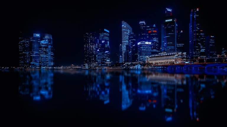 illuminated-cityscape-against-blue-sky-at-night-316093