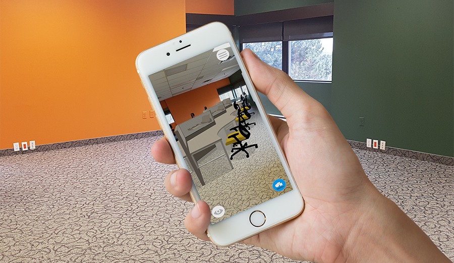 A mockup of someone using augmented reality on their phone to see how a row of desks would look in their space. An example of virtual and augmented reality tools in action