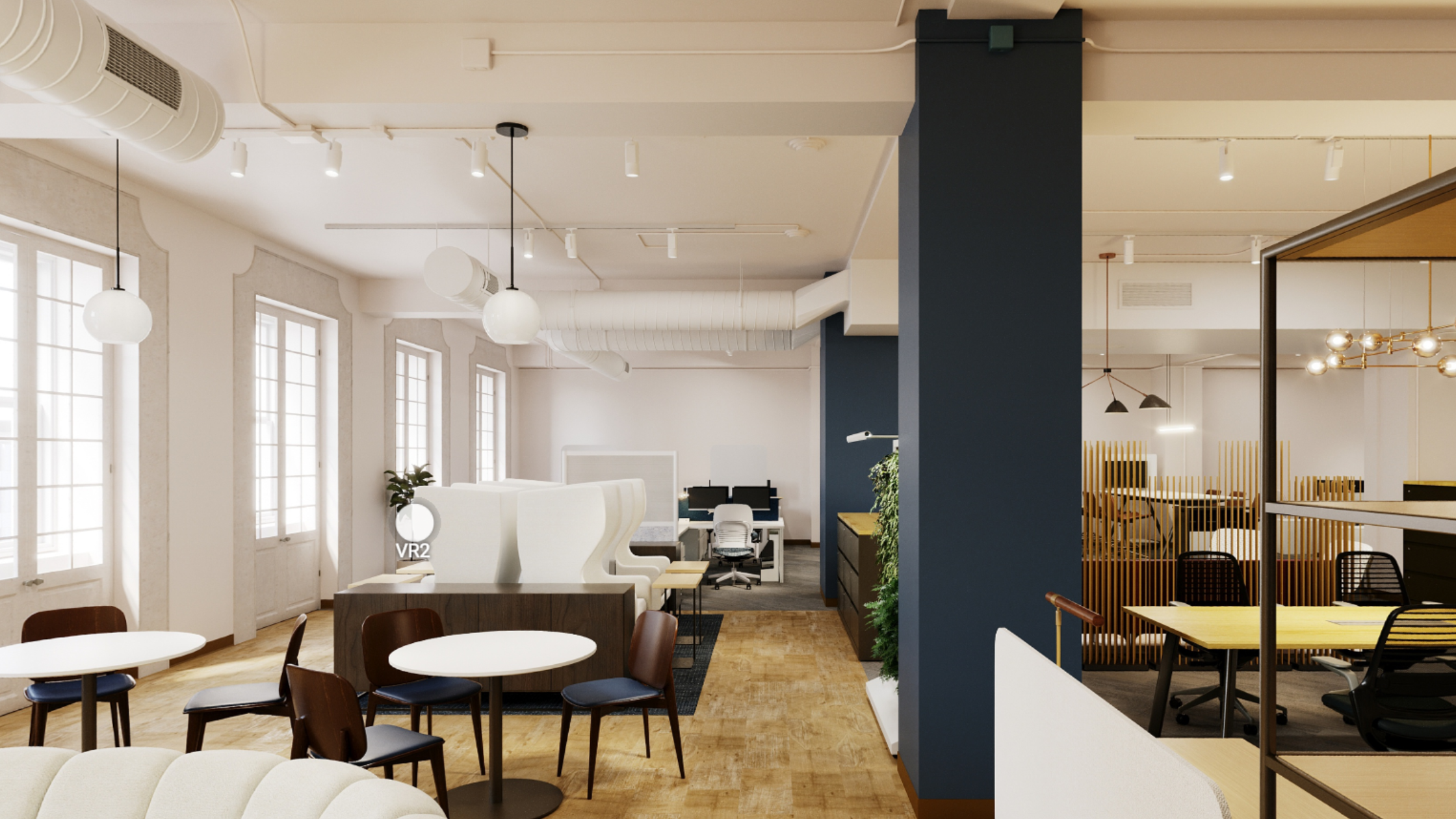 A screenshot of a virtual showroom created by KiSP. It shows a hotspot called VR2 that can be used to move around the showroom. the showroom contains multiple types of furniture that you can find in an office space. 